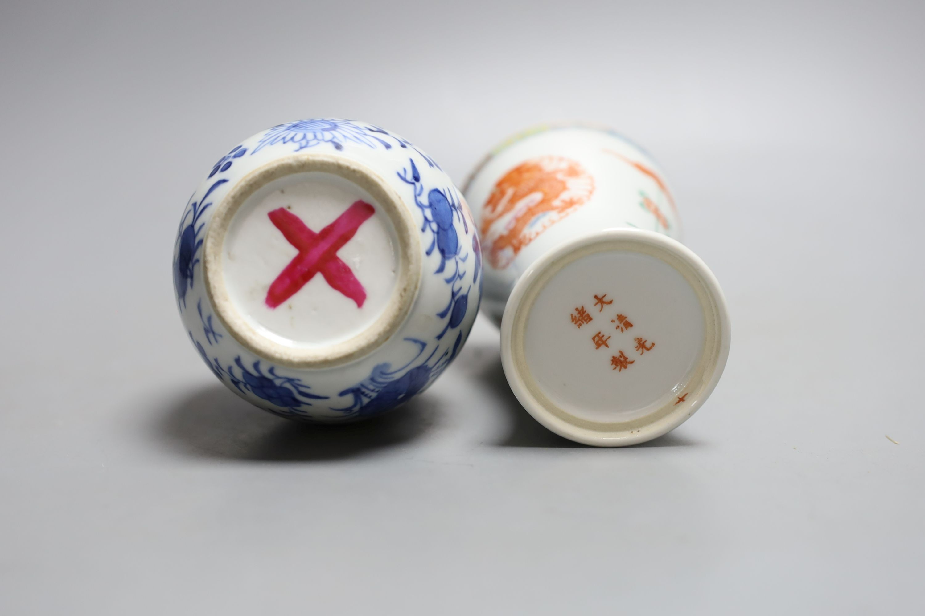 A 19th century Chinese blue and white gourd shape vase and a Chinese cup with inscription on base - tallest 14cm